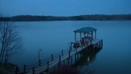 Moonlit lakeside scene in The Hunting Wives | Image via Rotten Tomatoes TV